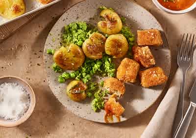 Veganer Erbsen-Stampf mit Quetschkartoffeln und Tofu-Nuggets-image